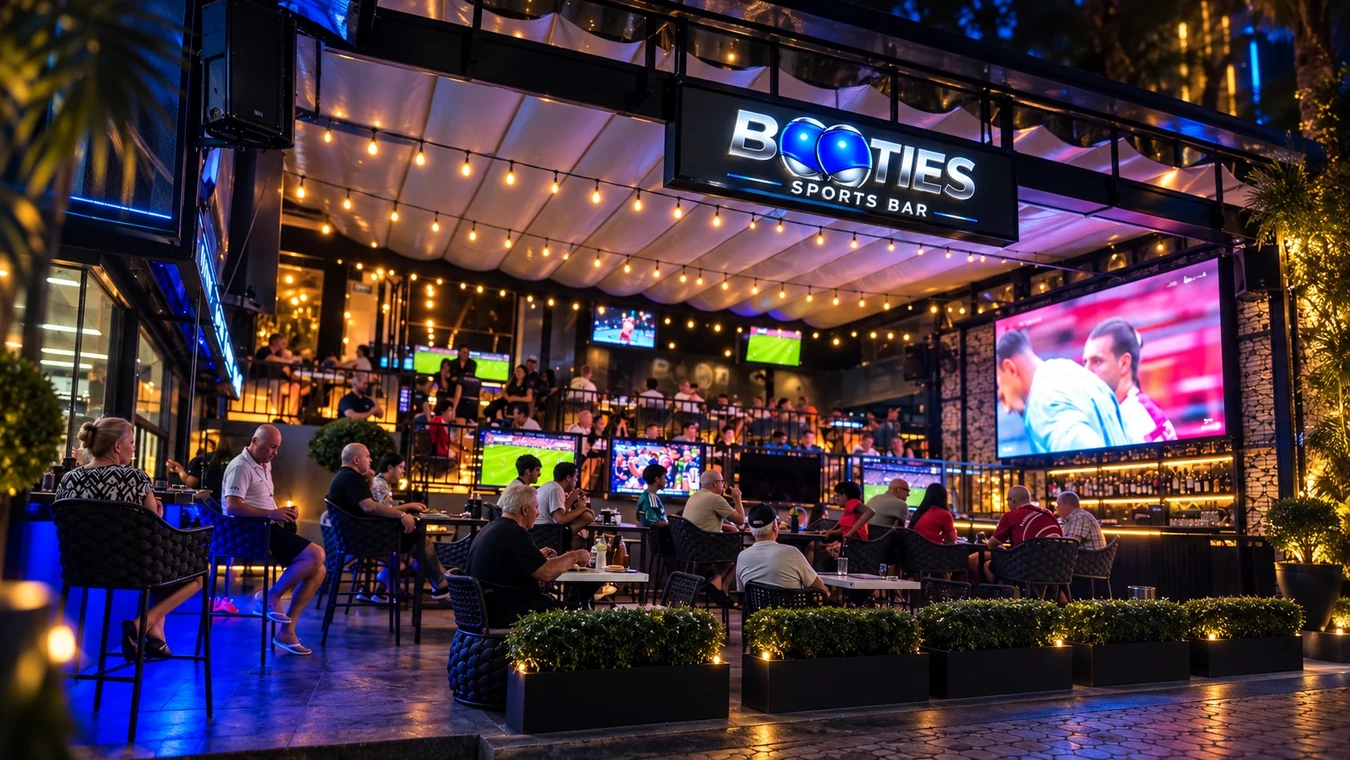 Booties Sports Bar Pattaya with live sports screens, a large LED wall and seating